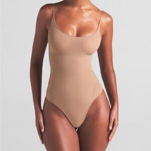 SKIMS Sculpting Nude Thong Bodysuit - Beige